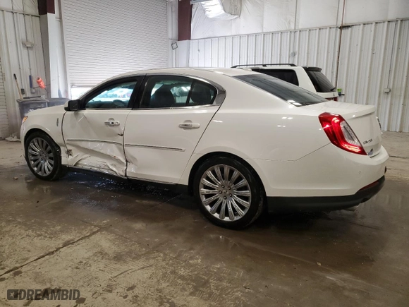 2014 Lincoln MKS with VIN 1LNHL9EK2EG605964, listed as a Copart auction lot 51810195 with 102,850 mi miles and Non Repairable. Bid and sale history available at carsss.com. Image 2.