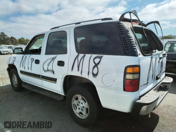 2004 Chevrolet Tahoe LS with VIN 1GNEC13V54J326622, listed as a Copart auction lot 73164854 with 241,083 mi miles and Salvage Title. Bid and sale history available at carsss.com. Image 2.