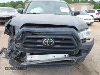2020 Toyota Tacoma SR with VIN 3TYRX5GN1LT002234, listed as a IAAI auction lot 42082830 with 128,589 mi miles and . Bid and sale history available at DreamBid. Image 6.