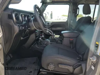 2023 Jeep Gladiator Sport S с VIN 1C6HJTAG3PL552959, выставлен на аукционе Copart как лот 56905635 с пробегом 30 356 миль миль и Списание • Salvage title. История ставок и продаж доступна на DreamBid. Изображение 7.