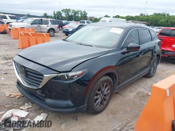 2021 Mazda CX-9 Sport with VIN JM3TCABY6M0522352, listed as a IAAI auction lot 42613136 with 106,167 mi miles and . Bid and sale history available at DreamBid. Image 17.