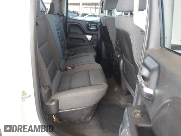 2015 Chevrolet Silverado 1500 LT with VIN 1GCVKREC1FZ415386, listed as a IAAI auction lot 42142990 with 165,409 mi miles and . Bid and sale history available at DreamBid. Image 8.