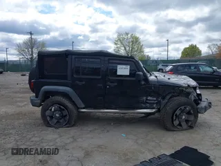 2013 Jeep Wrangler Unlimited Sport z VIN 1C4HJWDG3DL697226, wystawiony jako IAAI lot #42053059 z przebiegiem 134 504 mil mil oraz . Historia ofert i sprzedaży dostępna na DreamBid. Obrazek 13.