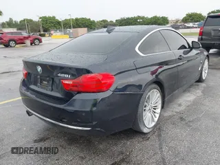 2015 BMW 4 Series 428i с VIN WBA3N3C56FK232264, выставлен на аукционе IAAI как лот 42411099 с пробегом 102 686 миль миль и . История ставок и продаж доступна на DreamBid. Изображение 4.