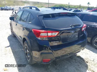 2019 Subaru Crosstrek Premium with VIN JF2GTACC9K8242115, listed as a IAAI auction lot 42010136 with 107,027 mi miles and . Bid and sale history available at DreamBid. Image 3.