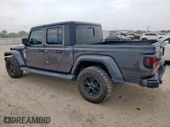 2021 Jeep Gladiator Willys с VIN 1C6HJTAG9ML606731, выставлен на аукционе Copart как лот 59873205 с пробегом 84 811 миль миль и Списание • Salvage title. История ставок и продаж доступна на DreamBid. Изображение 2.