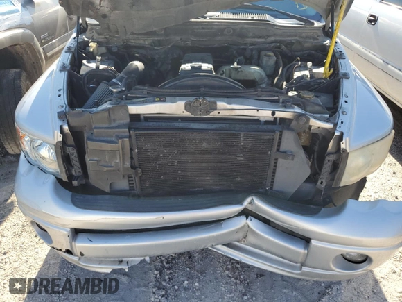 2005 Dodge 2500 ST z VIN 3D7KR28C65G740640, wystawiony jako Copart lot #55899875 z przebiegiem 334 290 mil mil oraz Szkoda całkowita • Salvage title. Historia ofert i sprzedaży dostępna na DreamBid. Obrazek 11.