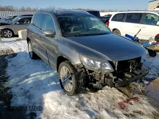 2014 Volkswagen Tiguan SE z VIN WVGAV3AXXEW505398, wystawiony jako Copart lot #41682155 z przebiegiem 137 147 mil mil oraz Nie do naprawy • Non repairable. Historia ofert i sprzedaży dostępna na DreamBid. Obrazek 15.