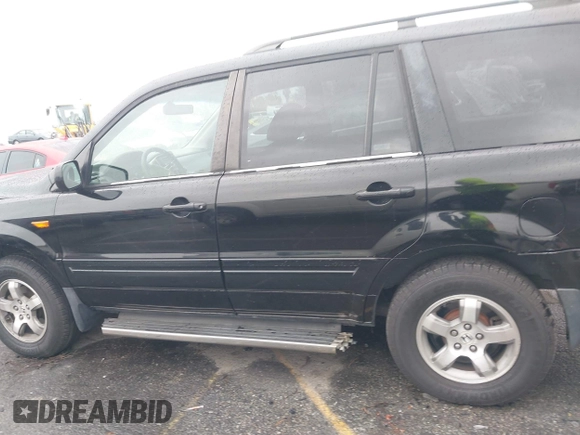 2007 Honda Pilot EX-L with VIN 2HKYF18557H500711, listed as a IAAI auction lot 41794731 with 168,553 mi miles. Bid and sale history available at carsss.com. Image 14.