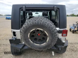 2011 Jeep Wrangler Unlimited Rubicon with VIN 1J4BA6H13BL537964, listed as a Copart auction lot 57532725 with 71,498 mi miles and Salvage title. Bid and sale history available at DreamBid. Image 6.