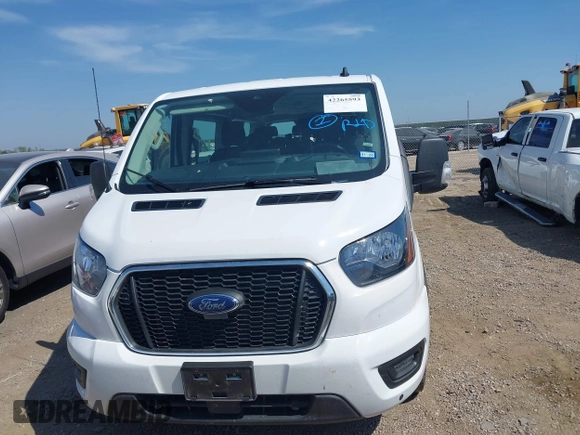 2024 Ford Transit Passenger XL z VIN 1FBAX2Y86RKA08969, wystawiony jako IAAI lot #42265593 z przebiegiem 27 690 mil mil oraz . Historia ofert i sprzedaży dostępna na DreamBid. Obrazek 12.