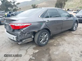 2017 Toyota Camry XLE with VIN 4T1BF1FKXHU389929, listed as a IAAI auction lot 42051551 with 98,285 mi miles. Bid and sale history available at carsss.com. Image 4.