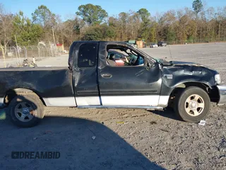 2003 Ford F-150 XL with VIN 1FTRX17W73NA09918, listed as a IAAI auction lot 41296725 with 1 mi miles. Bid and sale history available at carsss.com. Image 12.