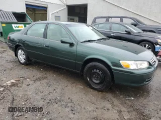 2000 Toyota Camry CE z VIN 4T1BG22K4YU977012, wystawiony jako Copart lot #59085085 z przebiegiem 146 838 mil mil oraz Szkoda całkowita • Salvage title. Historia ofert i sprzedaży dostępna na DreamBid. Obrazek 4.