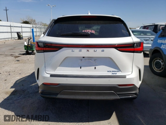 2022 Lexus NX 350h Luxury with VIN JTJHKCEZXN2005513, listed as a Copart auction lot 49705234 with 9,656 mi miles and . Bid and sale history available at DreamBid. Image 6.