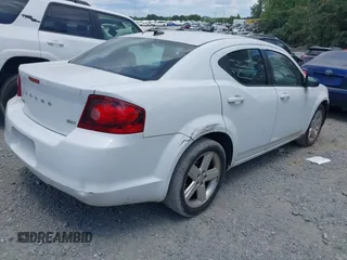2013 Dodge Avenger SXT with VIN 1C3CDZCB1DN708483, listed as a IAAI auction lot 42702833 with 185,681 mi miles and . Bid and sale history available at DreamBid. Image 4.