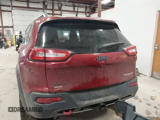 2015 Jeep Cherokee Trailhawk with VIN 1C4PJMBS7FW646577, listed as a IAAI auction lot 41404911 with 85,343 mi miles and . Bid and sale history available at DreamBid. Image 16.