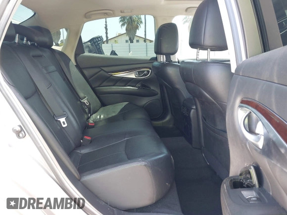 2012 Infiniti M with VIN JN1BY1AR3CM391052, listed as a IAAI auction lot 42178760 with 198,116 mi miles and . Bid and sale history available at DreamBid. Image 8.