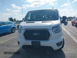2023 Ford Transit Passenger XL with VIN 1FBAX2YG6PKB08879, listed as a IAAI auction lot 42137671 with 44,204 mi miles. Bid and sale history available at carsss.com. Image 12.