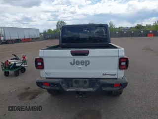 2021 Jeep Gladiator High Altitude z VIN 1C6HJTFG2ML567988, wystawiony jako IAAI lot #42103576 z przebiegiem 74 849 mil mil oraz . Historia ofert i sprzedaży dostępna na DreamBid. Obrazek 16.