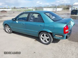 2002 Mazda Protege DX z VIN JM1BJ225721591435, wystawiony jako IAAI lot #42117544 z przebiegiem 191 185 mil mil oraz . Historia ofert i sprzedaży dostępna na DreamBid. Obrazek 3.