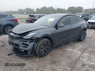 2024 Tesla Model Y with VIN 7SAYGDED8RF213927, listed as a IAAI auction lot 41386687 with 3,599 mi miles and . Bid and sale history available at DreamBid. Image 2.