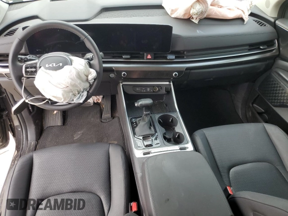 2025 Kia Carnival SX with VIN KNDNE5K37S6490478, listed as a Copart auction lot 51389565 with 6,929 mi miles and Salvage Title. Bid and sale history available at DreamBid. Image 8.