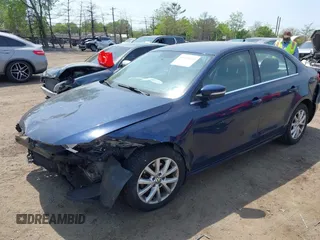 2013 Volkswagen Jetta SE with VIN 3VWDP7AJ7DM385781, listed as a IAAI auction lot 42160368 with 95,550 mi miles and . Bid and sale history available at DreamBid. Image 2.
