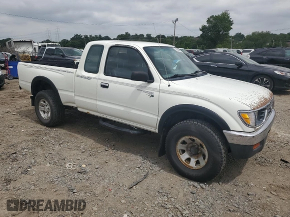 1996 Toyota Tacoma with VIN 4TAWN72N6TZ098086, listed as a Copart auction lot 64566685 with 379,805 mi miles and Salvage title. Bid and sale history available at DreamBid. Image 4.