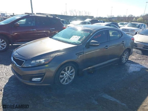 2014 Kia Optima EX with VIN 5XXGN4A72EG275751, listed as a IAAI auction lot 41807589 with 197,461 mi miles. Bid and sale history available at carsss.com. Image 2.