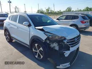 2017 Hyundai Tucson Sport z VIN KM8J33A23HU430831, wystawiony jako IAAI lot #41972770 z przebiegiem 100 207 mil mil oraz . Historia ofert i sprzedaży dostępna na DreamBid. Obrazek 1.