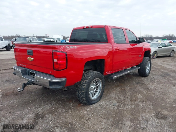 2014 Chevrolet Silverado 1500 LT with VIN 3GCUKREC7EG427441, listed as a IAAI auction lot 41576731 with 145,127 mi miles. Bid and sale history available at carsss.com. Image 4.