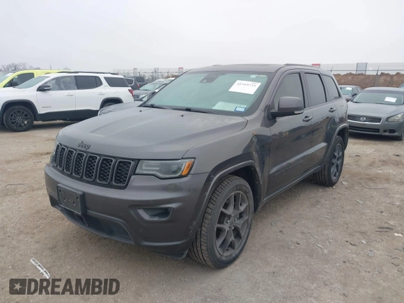 2021 Jeep Grand Cherokee 80th Anniversary z VIN 1C4RJFBGXMC621817, wystawiony jako IAAI lot #41519733 z przebiegiem 60 552 mil mil oraz . Historia ofert i sprzedaży dostępna na DreamBid. Obrazek 18.