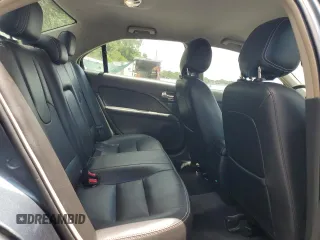 2012 Ford Fusion SEL z VIN 3FAHP0JA6CR295220, wystawiony jako Copart lot #62064665 z przebiegiem 145 191 mil mil oraz Szkoda całkowita • Salvage title. Historia ofert i sprzedaży dostępna na DreamBid. Obrazek 10.