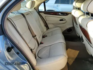 2005 Jaguar XJ VDP with VIN SAJWA82C65SG45247, listed as a Copart auction lot 77950594 with 0 mi miles and Salvage Title. Bid and sale history available at carsss.com. Image 10.