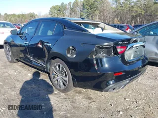 2019 Nissan Maxima Platinum z VIN 1N4AA6AV0KC379524, wystawiony jako IAAI lot #40862758 z przebiegiem 74 145 mil mil oraz . Historia ofert i sprzedaży dostępna na DreamBid. Obrazek 3.