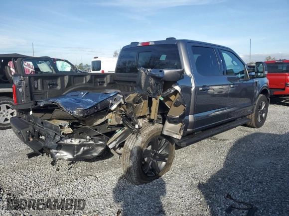 2023 Ford F-150 XL with VIN 1FTEW1EP4PFB38678, listed as a Copart auction lot 43024045 with 8,718 mi miles and Salvage title. Bid and sale history available at DreamBid. Image 3.