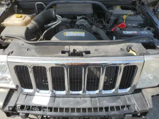 2009 Jeep Commander Sport z VIN 1J8HG48K39C501268, wystawiony jako Copart lot #64312325 z przebiegiem 184 794 mil mil oraz Szkoda całkowita • Salvage title. Historia ofert i sprzedaży dostępna na DreamBid. Obrazek 12.