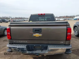 2014 Chevrolet Silverado 1500 LTZ with VIN 1GCVKSEC8EZ140508, listed as a IAAI auction lot 41821397 with 108,308 mi miles and . Bid and sale history available at DreamBid. Image 17.