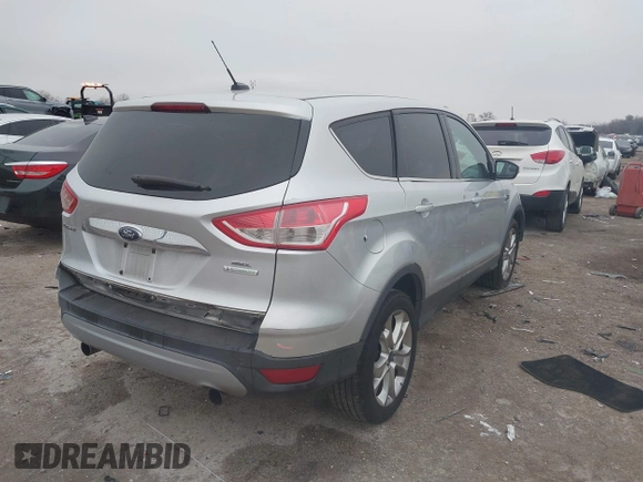 2013 Ford Escape SEL with VIN 1FMCU0H95DUA30836, listed as a IAAI auction lot 41608690 with 150,517 mi miles. Bid and sale history available at carsss.com. Image 4.