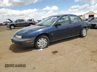 1999 Saturn SL with VIN 1G8ZF5287XZ265634, listed as a Copart auction lot 55973834 with 0 mi miles and Clean Title. Bid and sale history available at carsss.com. Image 1.
