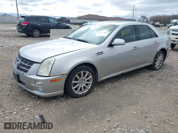 2008 Cadillac STS RWD w/1SB with VIN 1G6DW67V080126989, listed as a IAAI auction lot 42137899 with 123,638 mi miles. Bid and sale history available at carsss.com. Image 2.