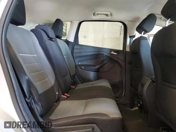2013 Ford Escape SE with VIN 1FMCU0GXXDUB10035, listed as a Copart auction lot 56817785 with 130,497 mi miles and Salvage title. Bid and sale history available at DreamBid. Image 11.