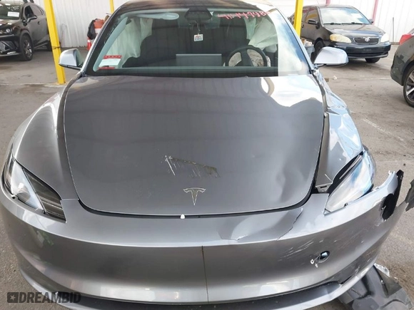 2025 Tesla Model 3 Long Range with VIN 5YJ3E1EBXSF912475, listed as a IAAI auction lot 41449488 with 3,100 mi miles. Bid and sale history available at carsss.com. Image 12.