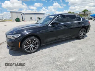 2019 BMW 3 Series 330i xDrive with VIN WBA5R7C51KAJ84676, listed as a Copart auction lot 61798525 with 105,185 mi miles and Salvage title. Bid and sale history available at DreamBid. Image 1.