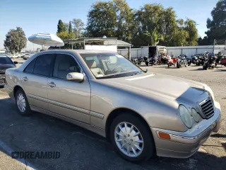2000 Mercedes-Benz E-Class AWD with VIN WDBJF82G0YX029026, listed as a Copart auction lot 78106604 with 134,482 mi miles and Salvage Title. Bid and sale history available at carsss.com. Image 4.