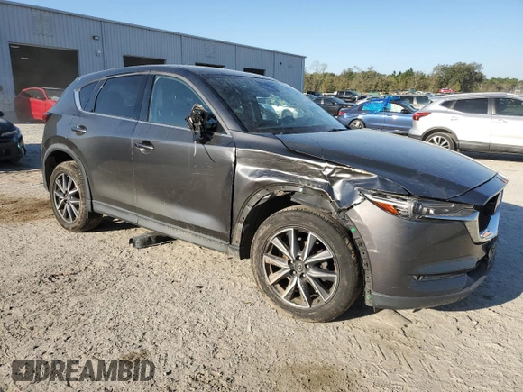 2018 Mazda CX-5 Grand Touring with VIN JM3KFBDM2J0439726, listed as a Copart auction lot 48707385 with 77,918 mi miles and Salvage Title. Bid and sale history available at carsss.com. Image 4.
