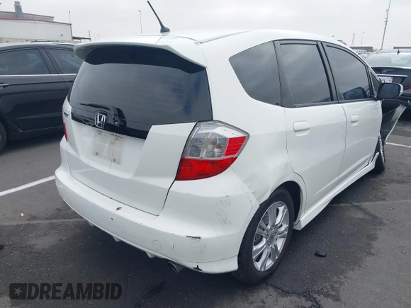 2010 Honda Fit Sport with VIN JHMGE8H43AC031411, listed as a IAAI auction lot 42599400 with 218,730 mi miles and . Bid and sale history available at DreamBid. Image 4.