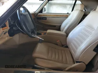 1994 Jaguar XJS with VIN SAJNX2743RC191142, listed as a Copart auction lot 78262994 with 70,111 mi miles and Salvage Title. Bid and sale history available at carsss.com. Image 7.