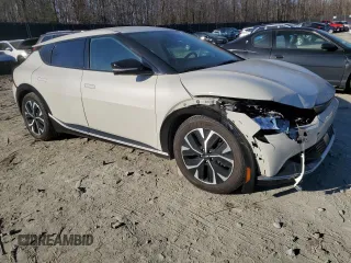 2022 Kia EV6 Wind with VIN KNDC3DLC4N5032784, listed as a Copart auction lot 46916385 with 70,102 mi miles and Salvage Title. Bid and sale history available at carsss.com. Image 4.